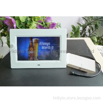 2014 hotsales newest 7" multi function digital photo frame with motion